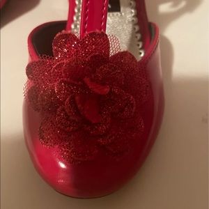 Brand Rachell shoes size 8 toddler red dress shoes has a little bit of scuffs